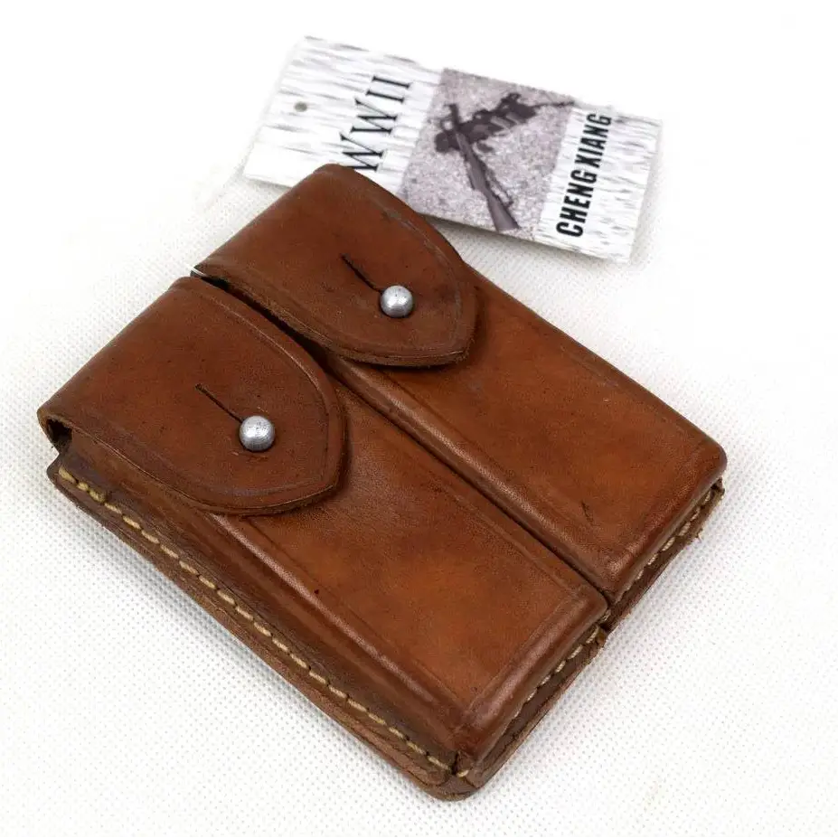 Chinese surplus pouch in brown leather for outdoor gear storage