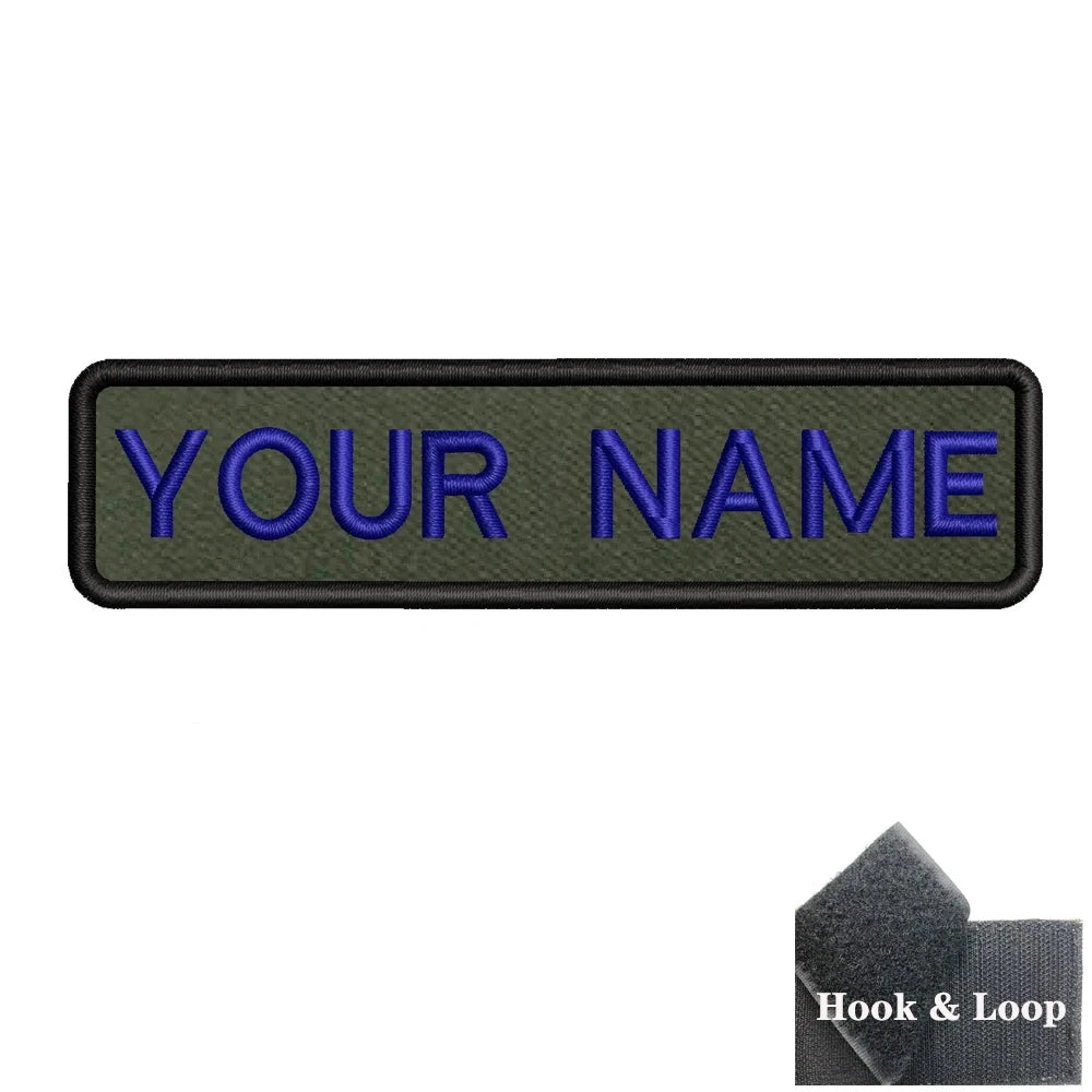 Custom military name patch for clothes in green with blue lettering and hook and loop backing