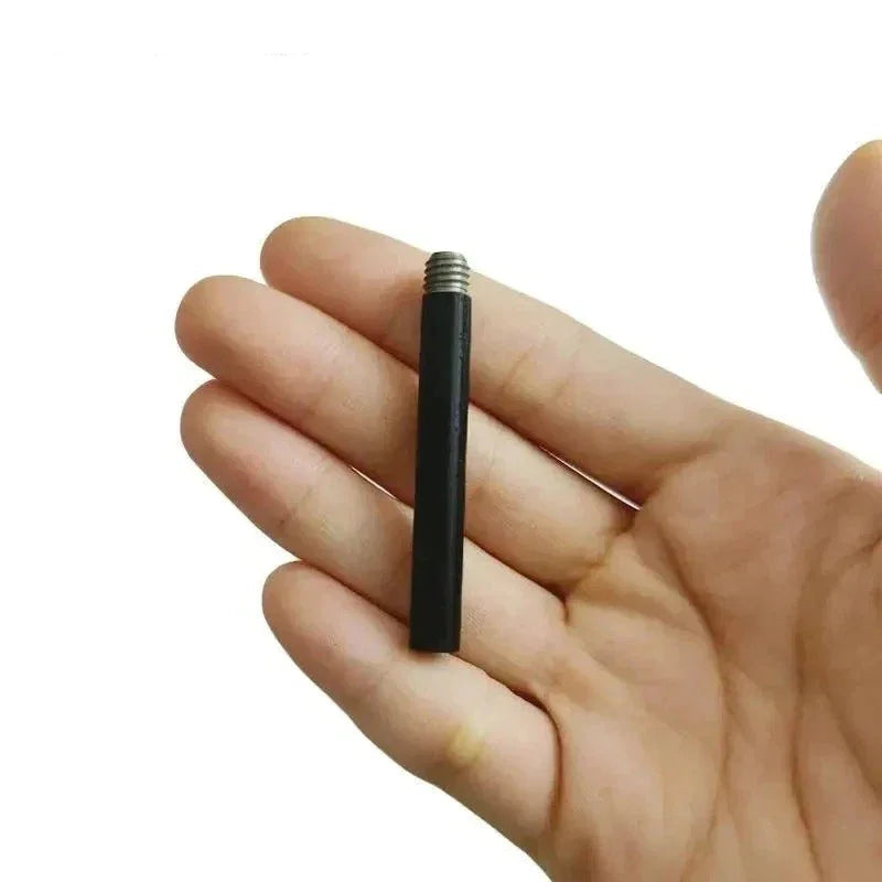 Hand holding an emergency fire starter stick designed for camping and outdoor survival