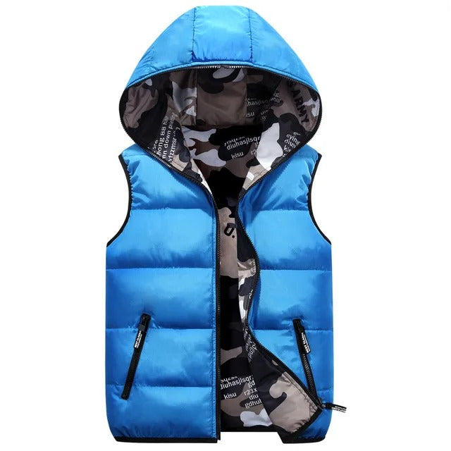 Kids hooded vest in blue with camouflage lining and pockets for outdoor play