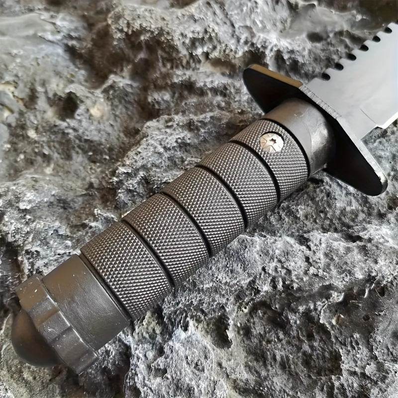 Durable hunting and camping knife with a textured grip for secure handling in outdoor activities