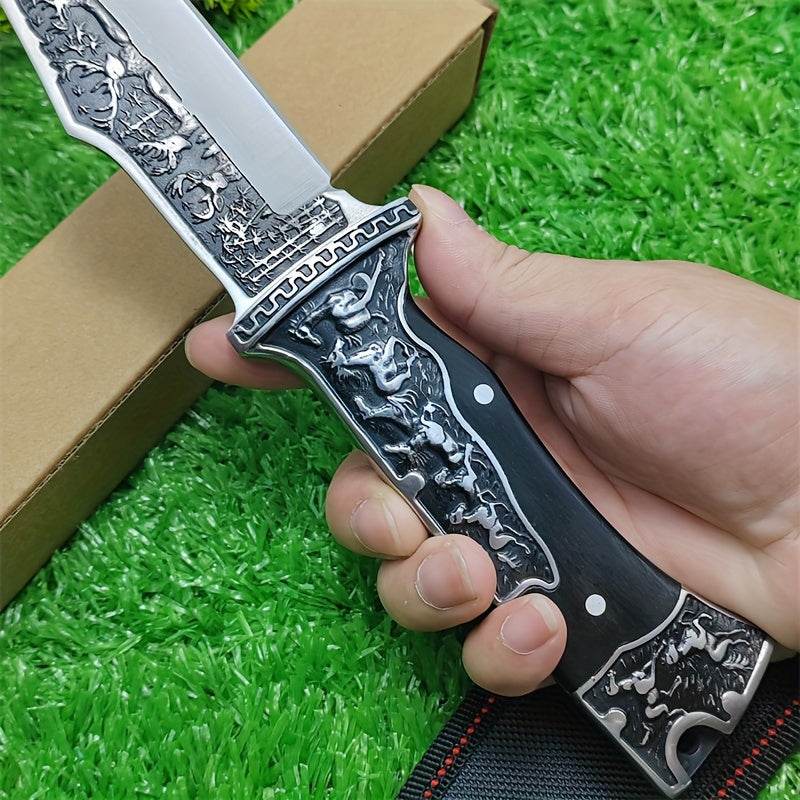 Intricately designed stainless steel hunting knife with detailed handle, perfect for outdoor enthusiasts
