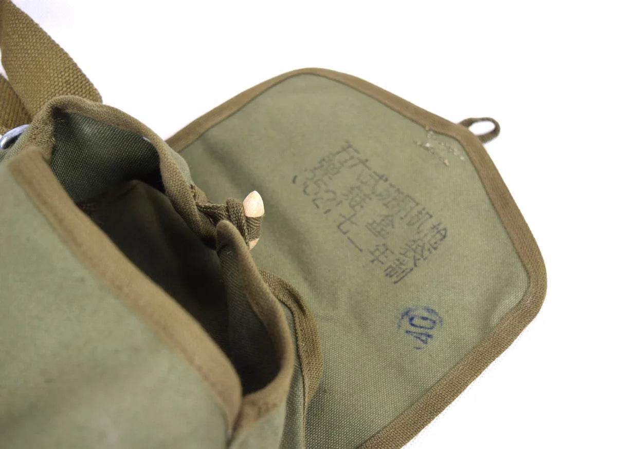 Vietnam War drum mag pouch in olive green with internal storage and military markings