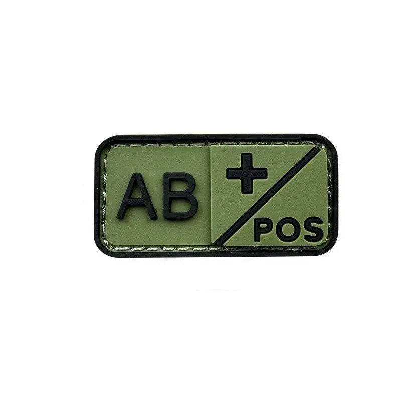 3D PVC blood type patch in green with AB POS designation for military uniforms
