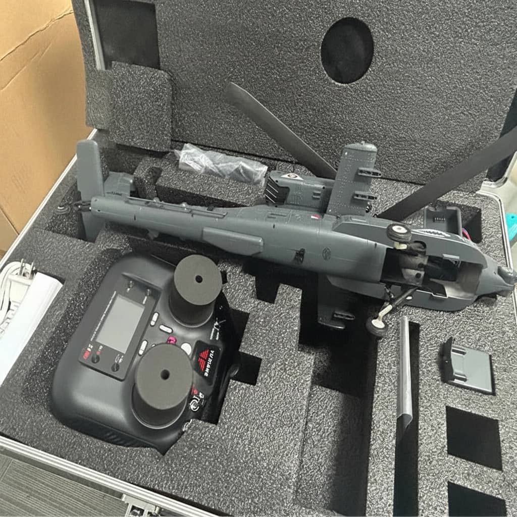 Apache RC helicopter with remote control, designed for outdoor flying