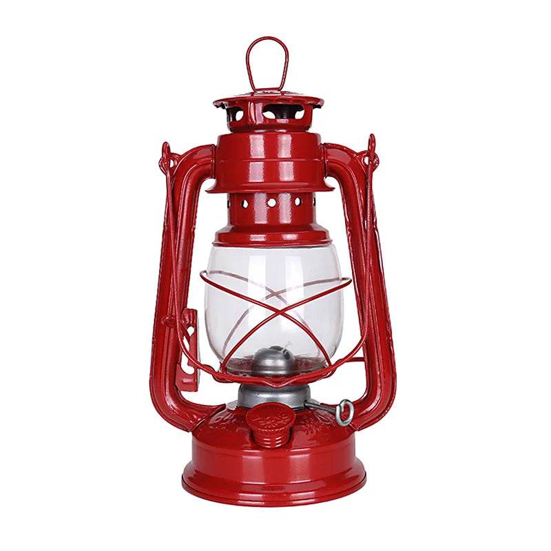 Retro kerosene lamp in red, ideal for camping and outdoor adventures with classic design