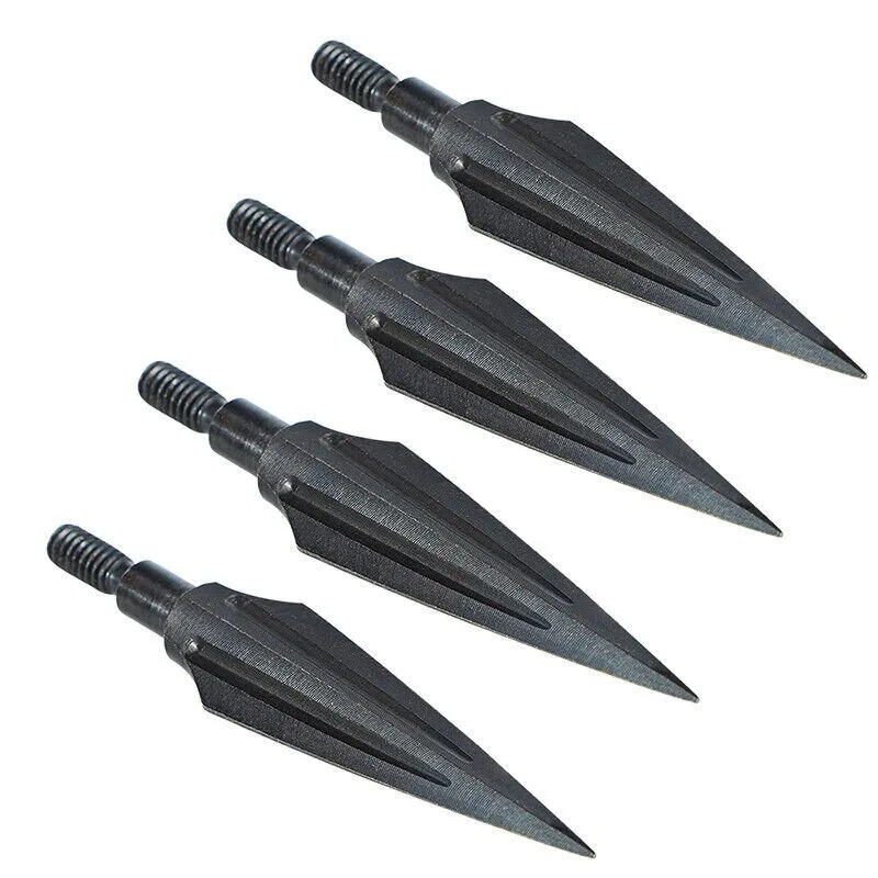 Four black carbon steel hunting arrowheads on a white background