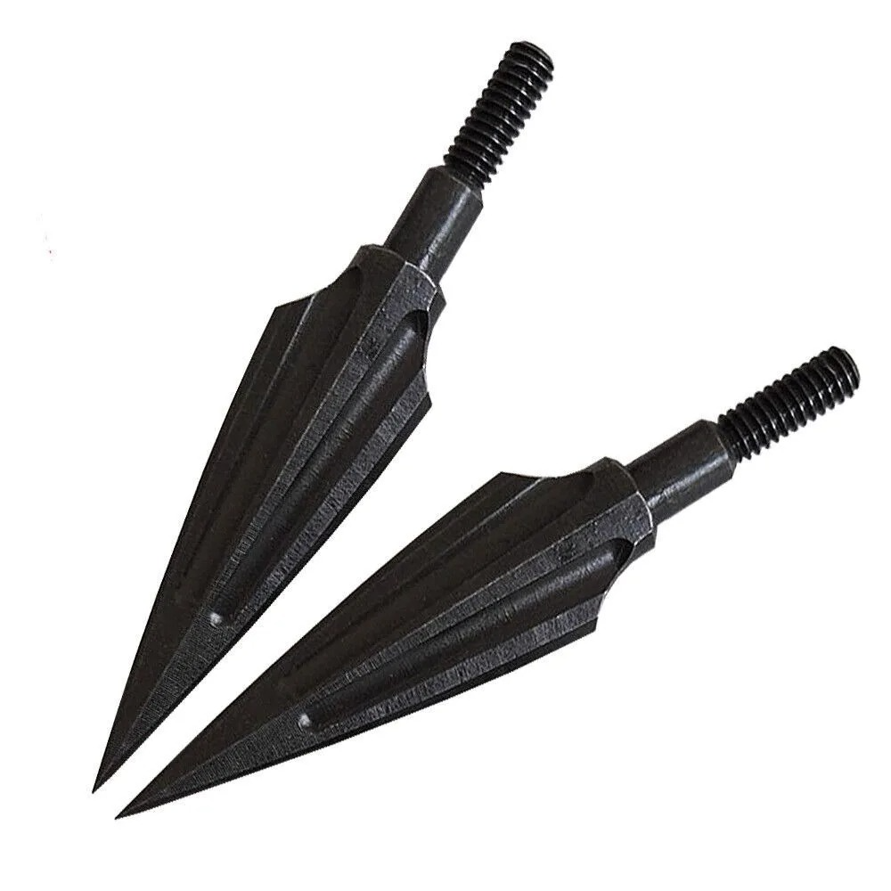 Two black carbon steel hunting arrowheads on a white background