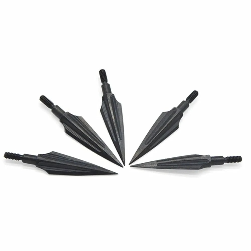 Set of black carbon steel hunting arrowheads arranged in a circular pattern on a white background