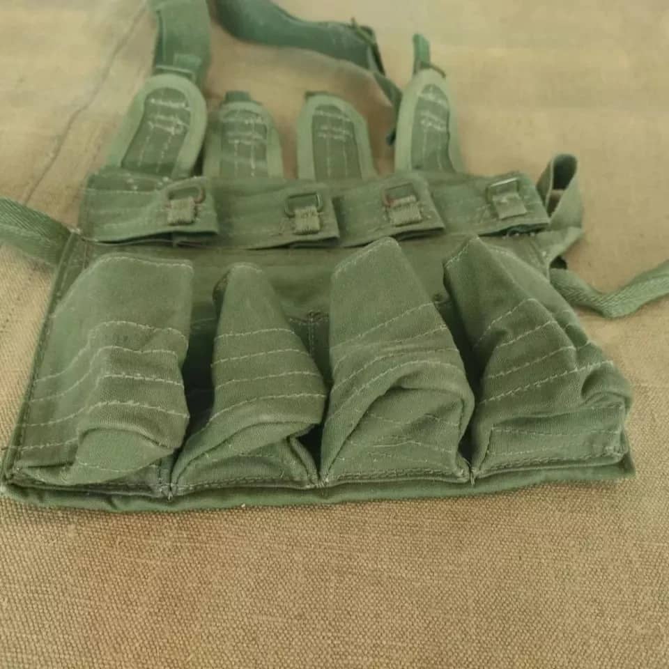 Chinese canvas pouch in green with multiple compartments for storage