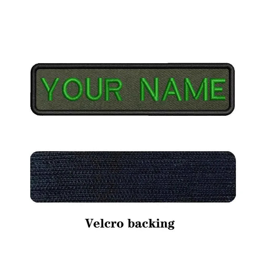 Custom name patch in green text with Velcro backing for military uniforms