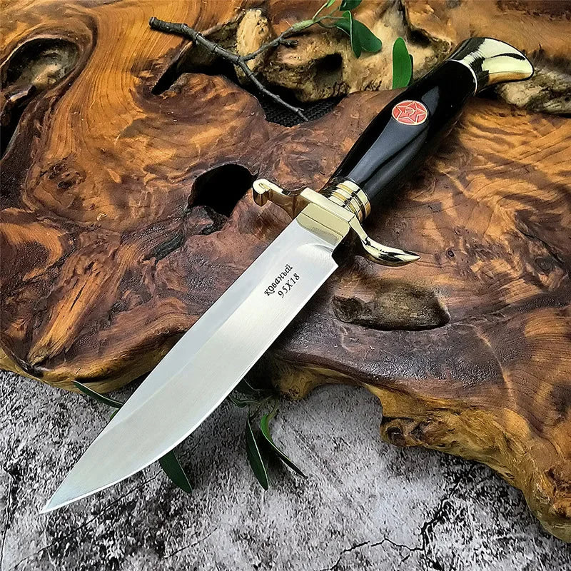 Finka NKVD knife with sleek silver blade and ergonomic black handle for outdoor use