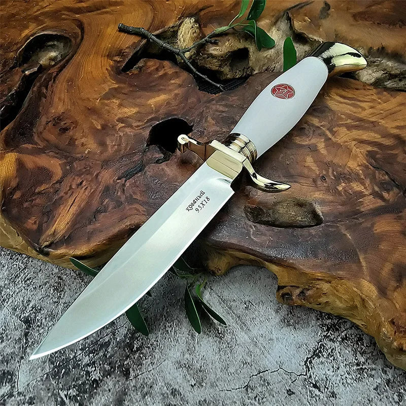 Finka NKVD knife with white handle, ideal for outdoor tasks