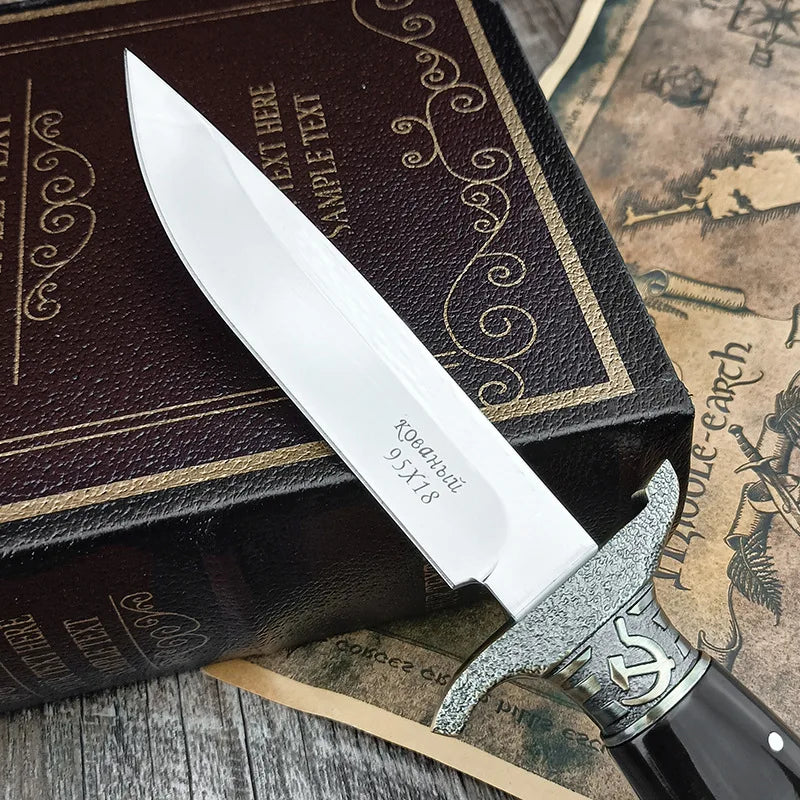 Finka NKVD knife with silver blade and decorative handle for outdoor use