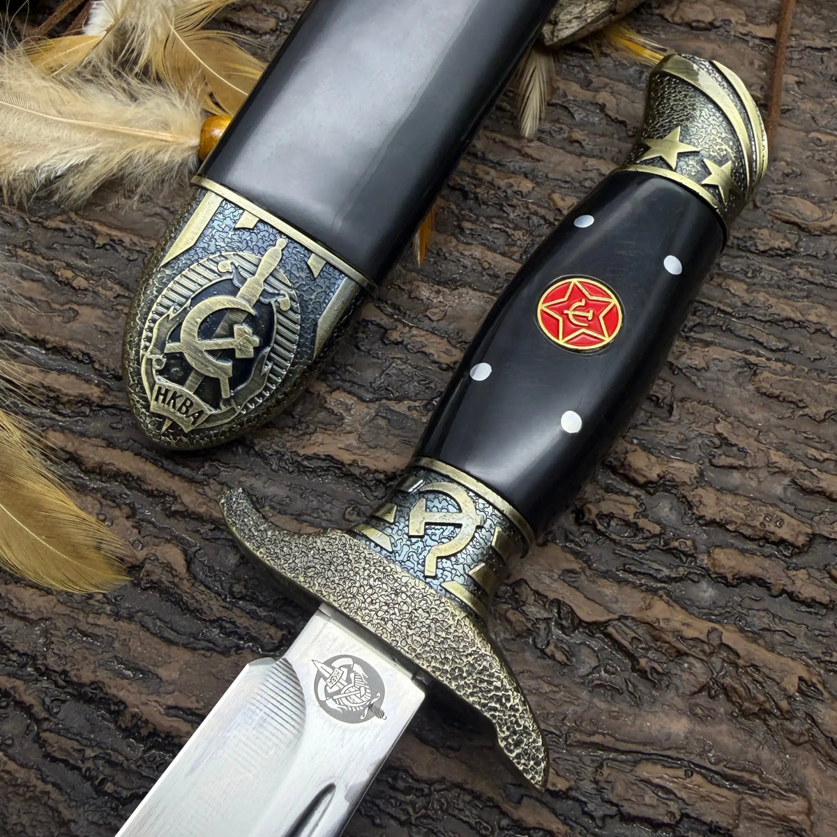 Finka NKVD knife with decorative handle and leather sheath for outdoor use
