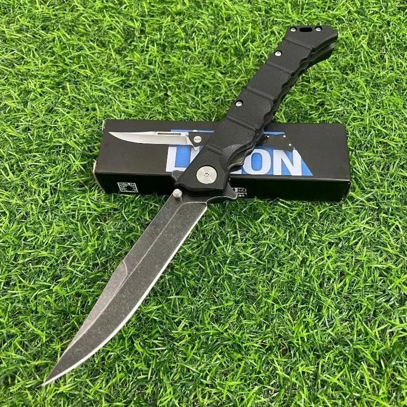 Folding utility knife with black handle and durable blade for versatile cutting tasks