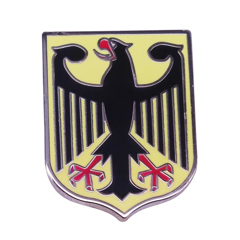 German badge replica in black and yellow, featuring an eagle emblem
