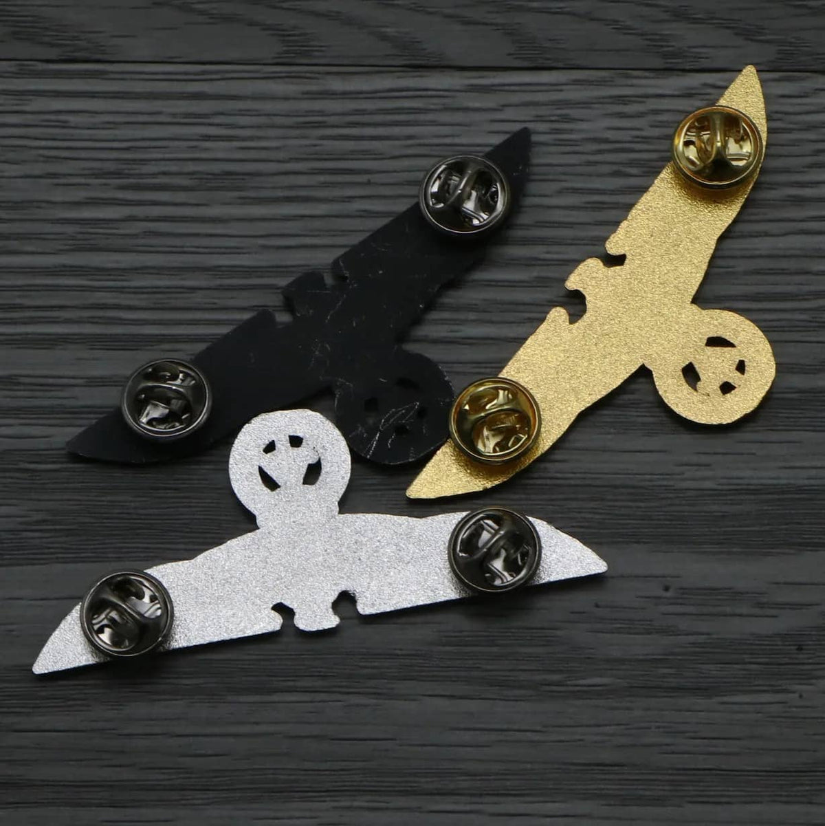 German Eagle Badge in black, silver, and gold for military display