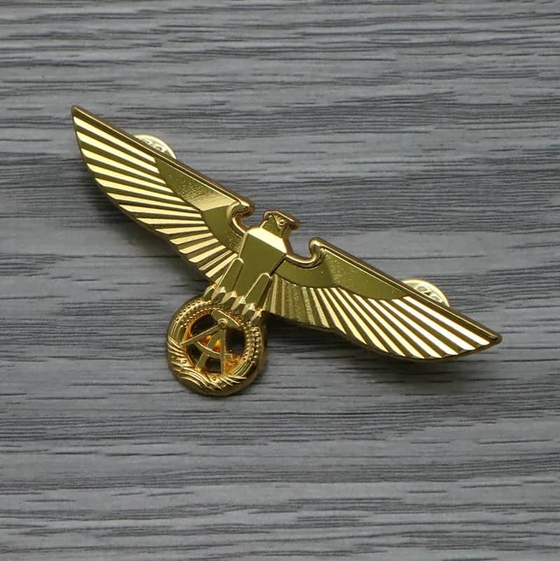 Gold German Eagle Badge with detailed eagle design for military enthusiasts