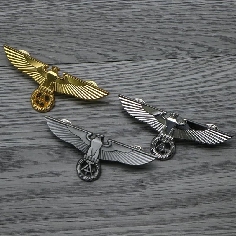 German Eagle Badge in gold, silver, and bronze for military collectors