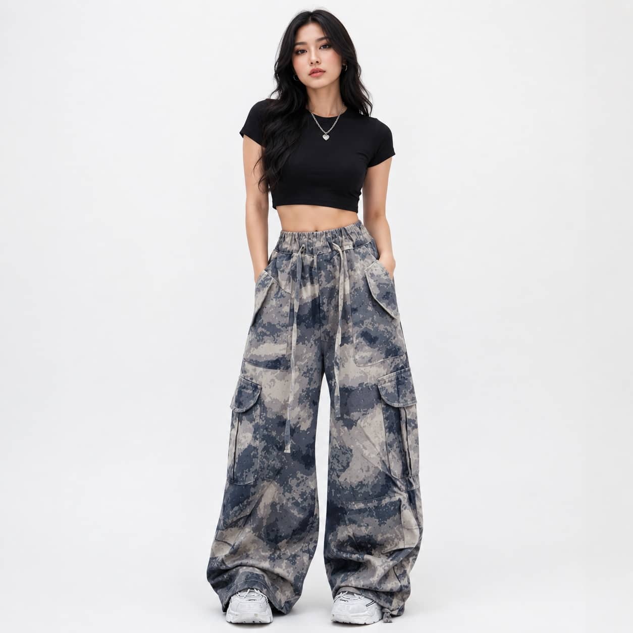 Girls camouflage cargo pants with elastic waist, loose fit and pockets for outdoor play and casual wear