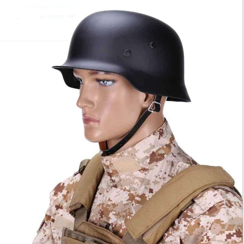 High quality M35 helmet in matte black worn by a model in military camouflage uniform
