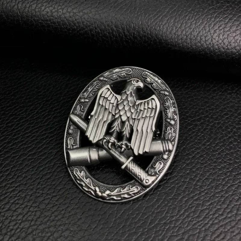 German assault operations medal with eagle design and crossed rifles on a dark background