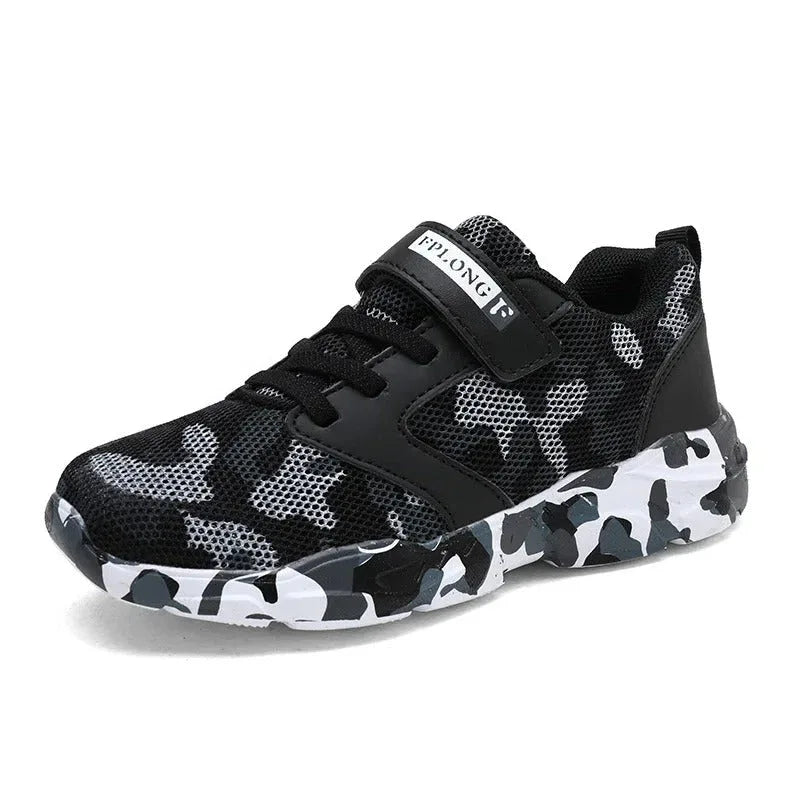 Kids camouflage sneakers in black and gray with adjustable strap for active play