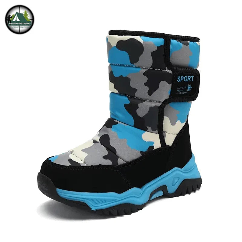 Kids snow boots in blue camouflage design for winter outdoor activities