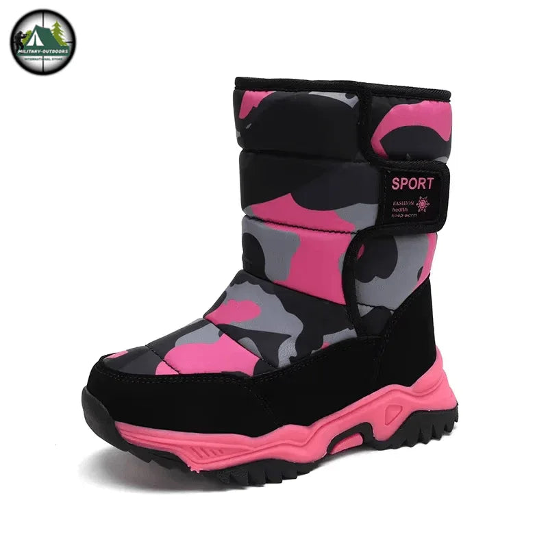 Kids snow boots in pink camo design for winter fun