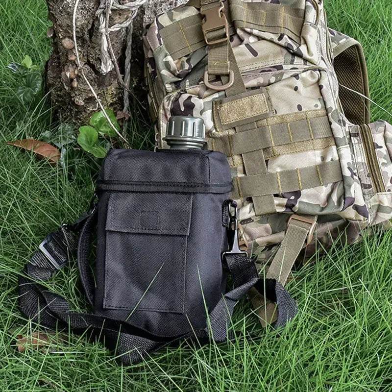 Large outdoor water bottle in black with durable carrying case for outdoor adventures