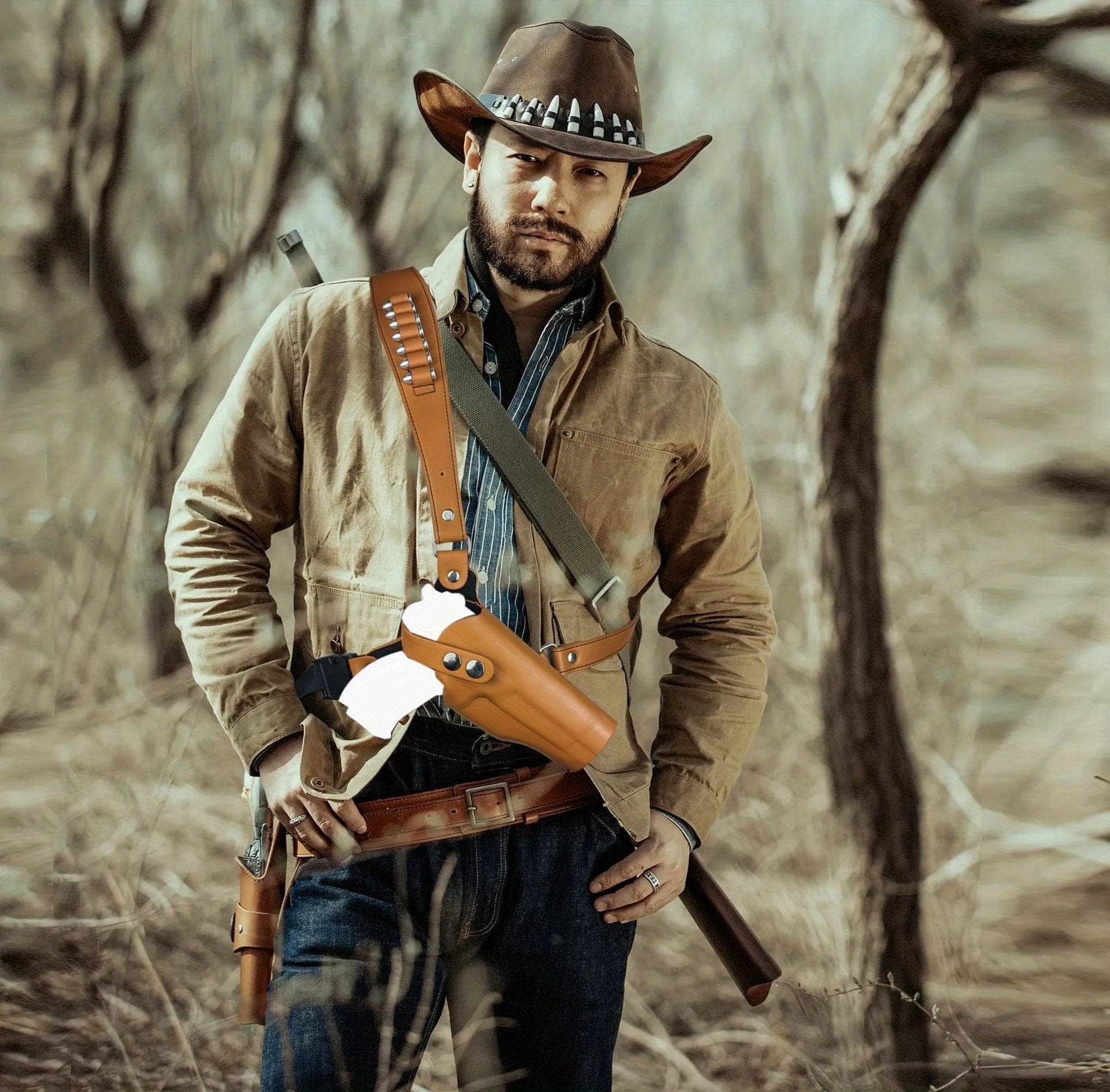 M1911 shoulder holster in brown leather worn by man in cowboy attire outdoors