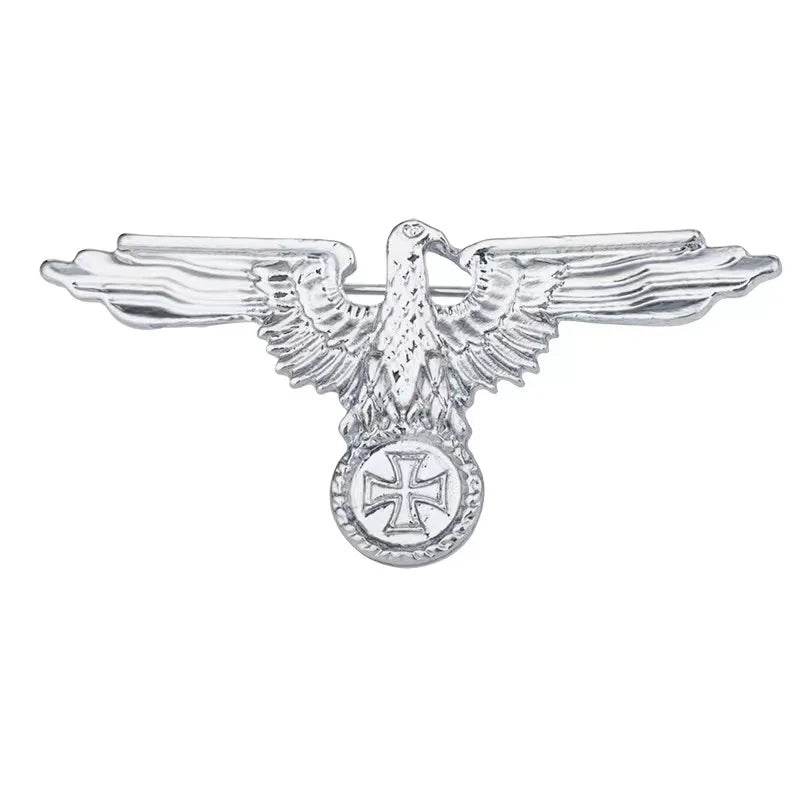 Silver WW2 German Luftwaffe badges featuring a detailed eagle and cross design