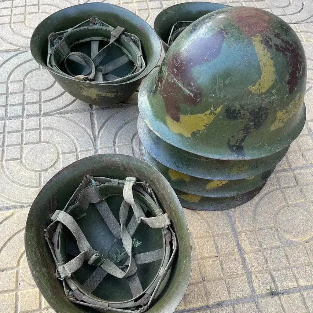 Chinese Army GK80 Helmet in camo design with interior straps, stacked for display