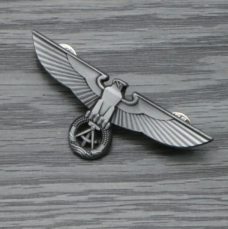 German Eagle Badge in silver with detailed eagle design for military collectors