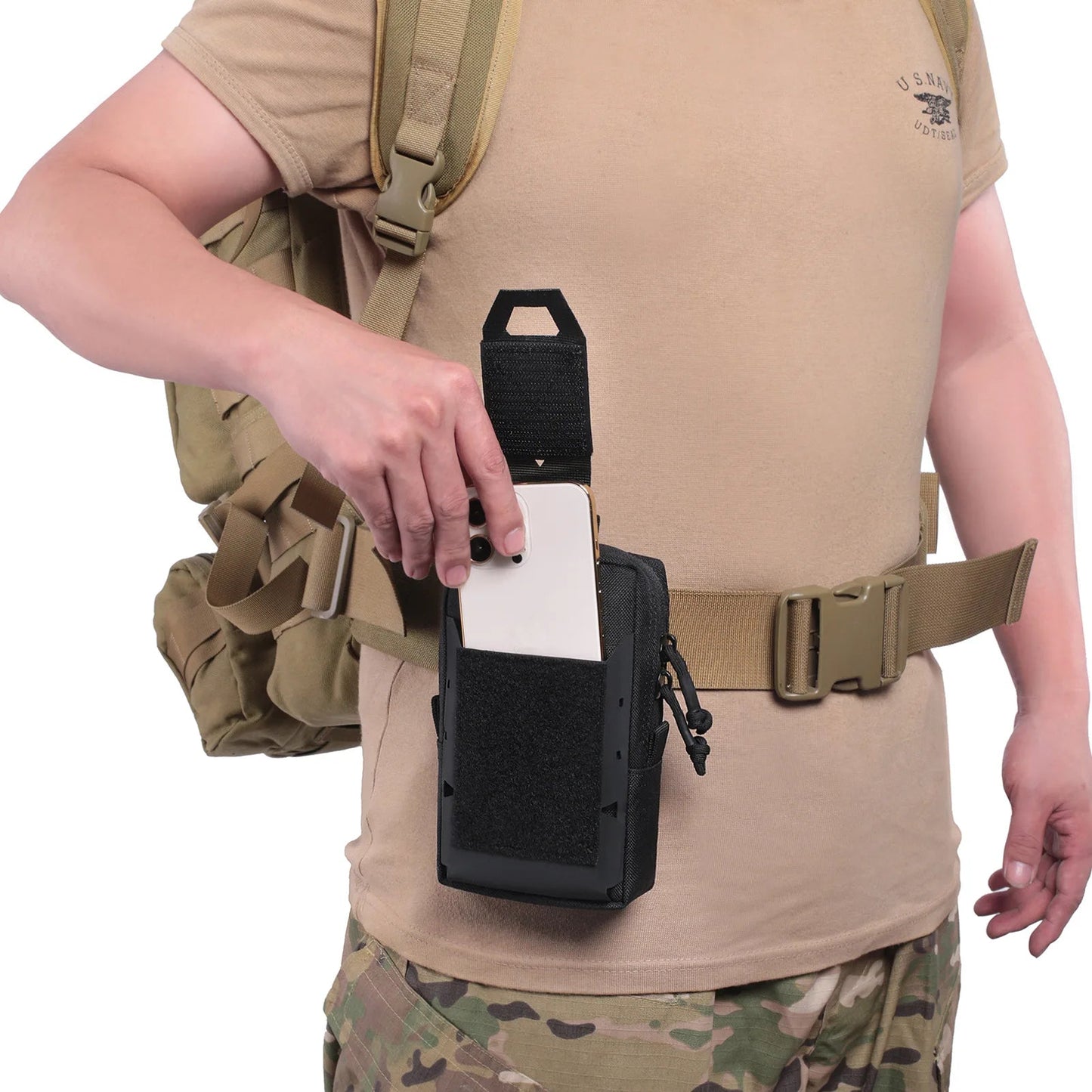 Military multi-function pouch attached to a tactical belt, designed for storing phones and small gear