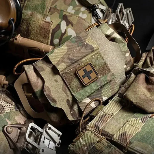 Molle first aid kit in camouflage for outdoor emergency use