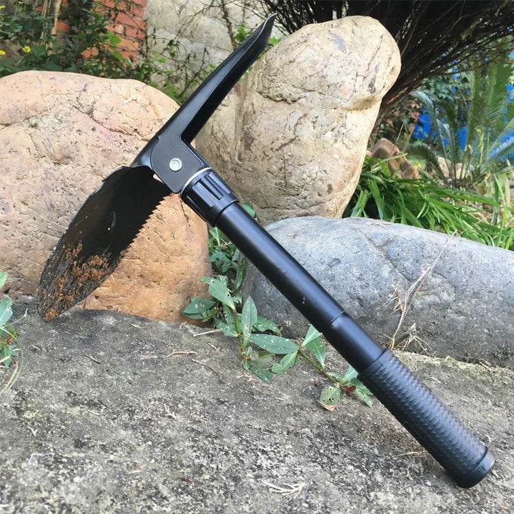 Multifunctional folding shovel in black for camping and gardening tasks