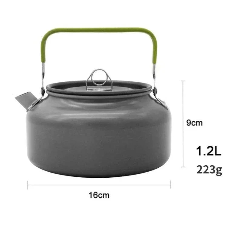 Gray outdoor camping kettle with green handle for easy use