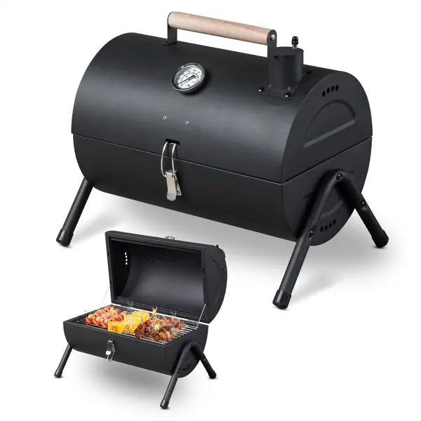 Black outdoor charcoal grill with temperature gauge and removable rack