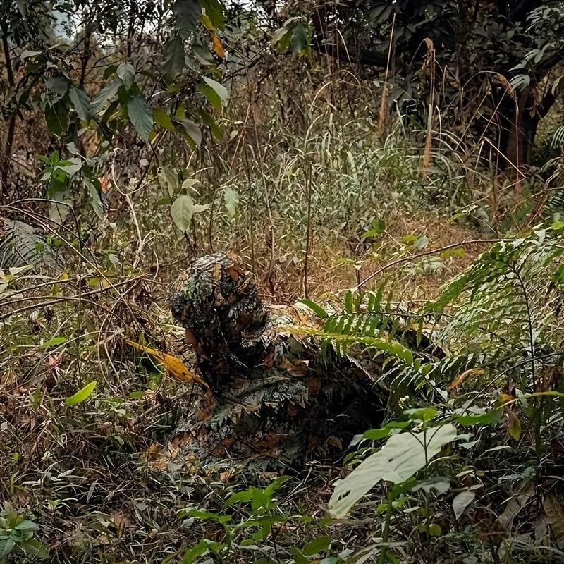 Outdoor leaf mantle in camouflage blending seamlessly with foliage for outdoor concealment