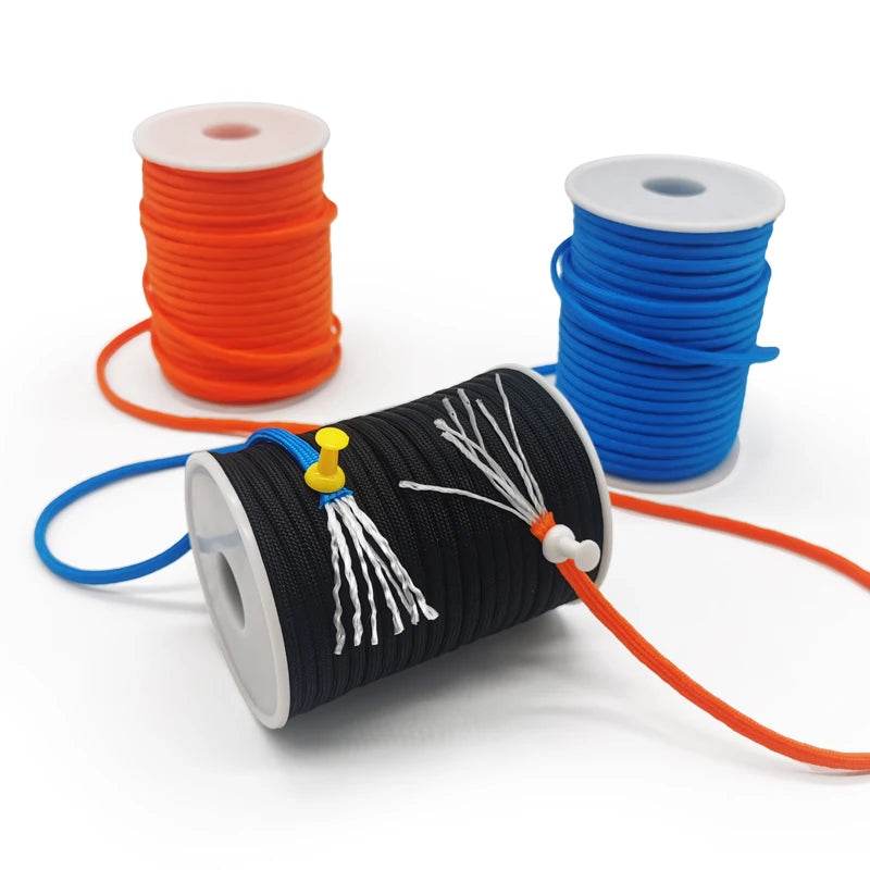 Outdoor paracord rope in black, orange, and blue for camping and survival use