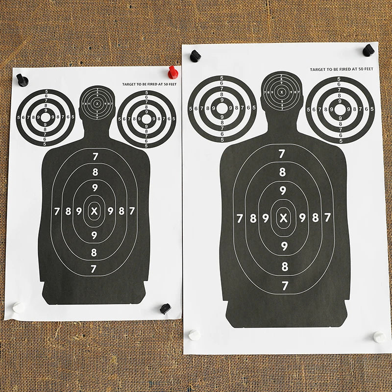 Paper silhouette target for shooting practice with scoring rings