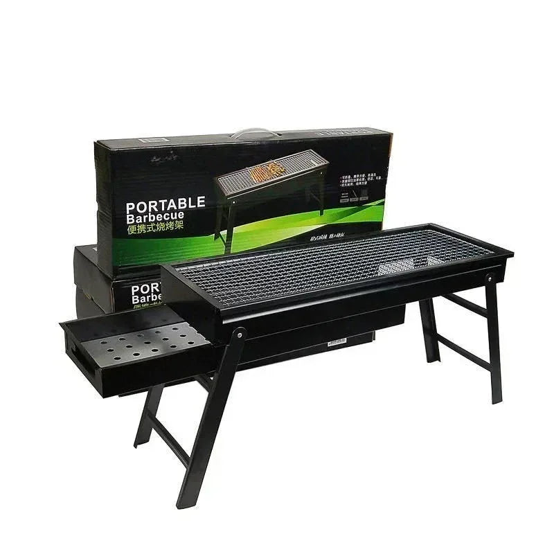 Portable charcoal barbecue with foldable legs for easy outdoor cooking