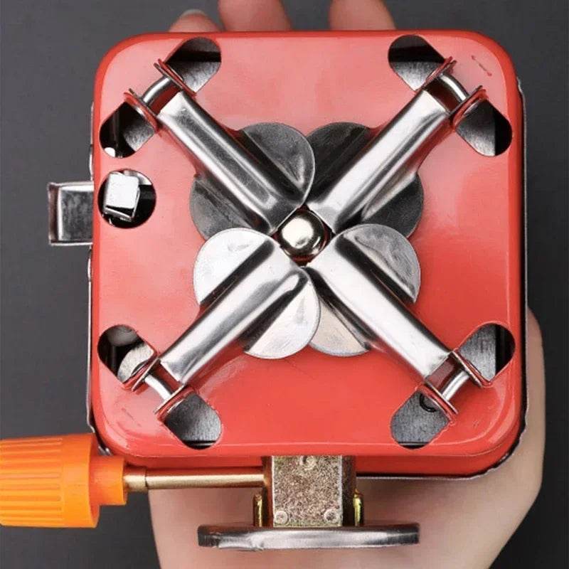 Portable gas stove in red for camping and outdoor cooking