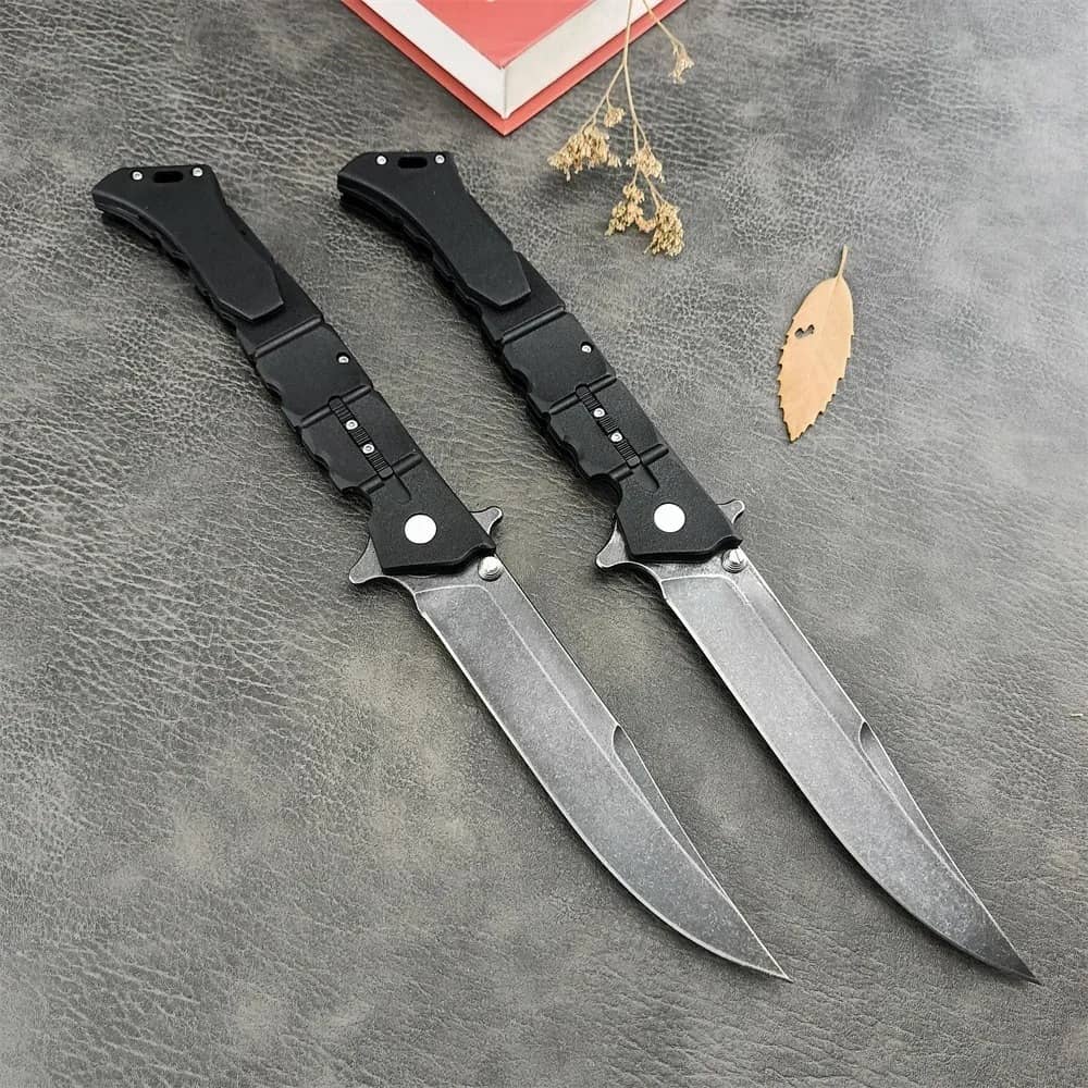 Black professional survival knife with dual blade design for outdoor adventures