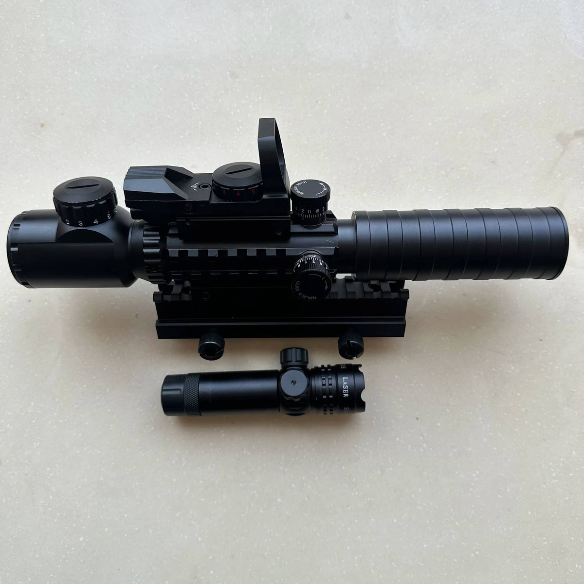 Rifle scope combo in black with adjustable zoom and tactical features
