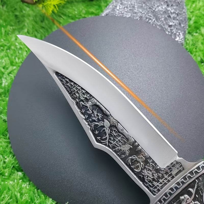 Intricate stainless steel hunting knife with a sleek design and detailed handle, perfect for outdoor use