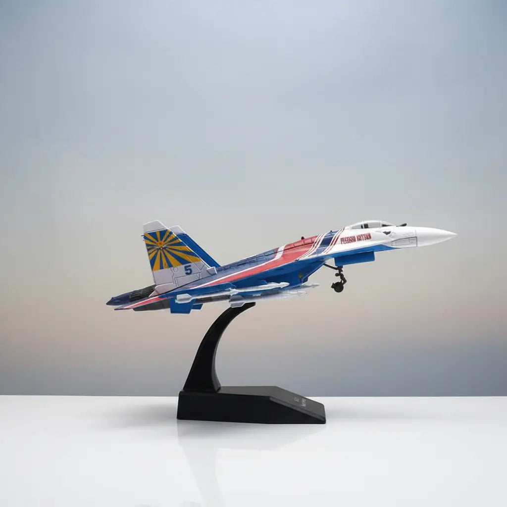 SU-35 fighter jet model in red and blue with display stand