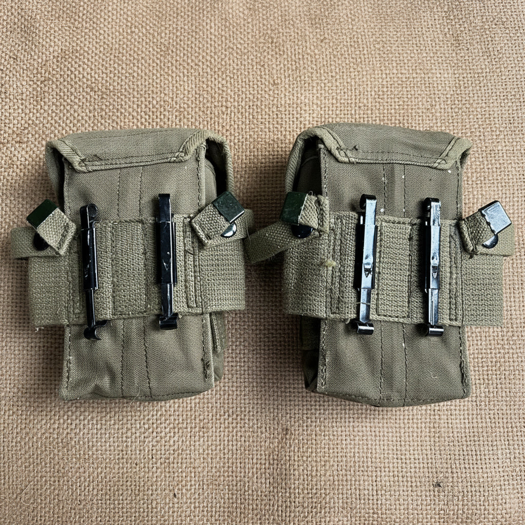 Military green surplus pouches with adjustable straps for storage